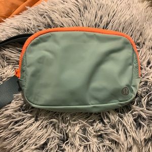 Lululemon teal and orange belt bag